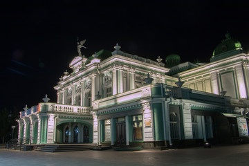 Fototapeta na wymiar academic drama theatre in Omsk Siberia Russia at night