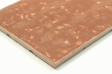 Whole chocolate with nuts and raisins. Delicious dessert