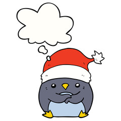 cute cartoon penguin wearing christmas hat and thought bubble
