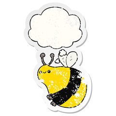 cartoon bee and thought bubble as a distressed worn sticker