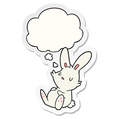 cartoon rabbit sleeping and thought bubble as a printed sticker