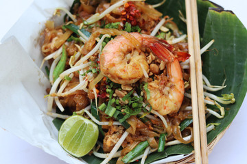 Fried noodle Thai style with prawns (Pad Thai in Thai language). 