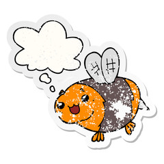 funny cartoon bee and thought bubble as a distressed worn sticker