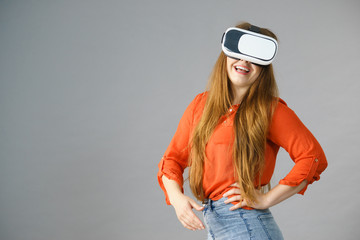 Girl wearing virtual reality goggles.