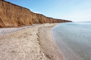 Shore of the Azov Sea in the morning sun.