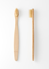 Bamboo toothbrushes isolated on white