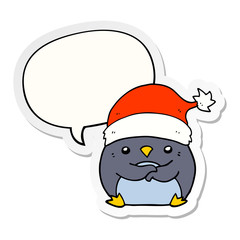cute cartoon penguin wearing christmas hat and speech bubble sticker