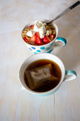 cup of coffee with cookies on a white background