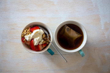 cup of coffee on wooden background