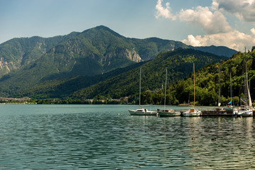 Sailboats in the Caldonazzo lake, Italian Alps, Valsugana valley, Trento province, Trentino Alto Adige, Italy, Europe