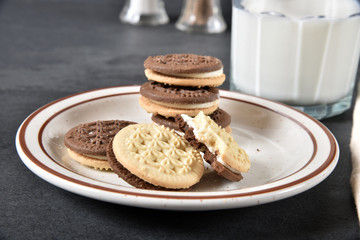 Duplex cookies and a glass of milk