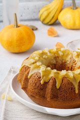 Sweet pumpkin bundt cake topped with sugar glaze.