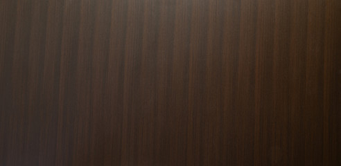 Dark brown wood panel background texture