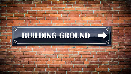 Fototapeta premium Street Sign BUILDING GROUND
