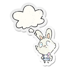 cartoon rabbit shrugging shoulders and thought bubble as a distressed worn sticker