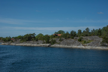 Islands in the Stockholm outer archipelago a sunny sommer day around the bay Bergbofj&auml;rden at the island M&ouml;ja