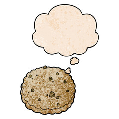 cartoon biscuit and thought bubble in grunge texture pattern style