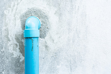 Old PVC pipe on the wall.