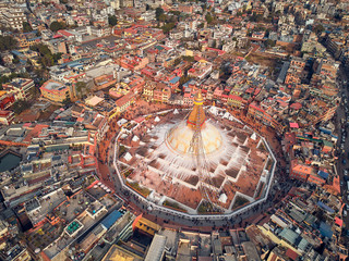 Aerial view on streets of Kathmandu and a stupa of Boudnath is created in the form of a Buddhist mandala. Nepal, shooting from the drone.