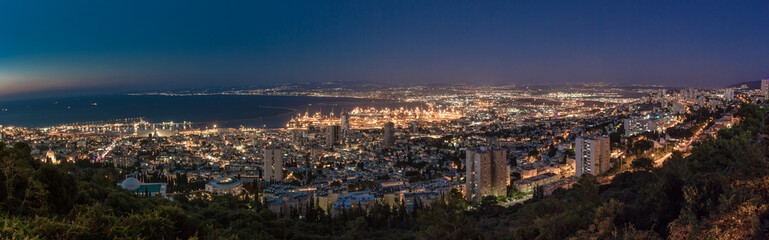 Fototapeta na wymiar Panoramic view of downtown Haifa, Haifa harbor and bay at night. View from Mount Carmel
