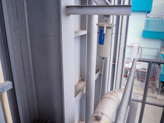 Spring hanger pipe support in power plant.