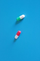 Pharmacology pills on blue background
