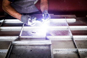 Worker Welding Stainless Steel