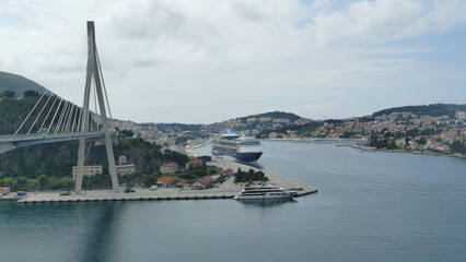 Naklejka premium Dubrovnik harbour with cruise ship and Franjo Tudman Bridge, Croatia