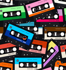 Seamless pattern with old audio retro cassettes 