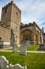 Fototapeta na wymiar The churchyard of St Michael the Archangel Church. Lyme Regis. West Dorset. England