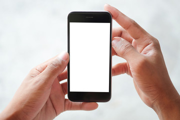 Cropped shot view of man hands holding smart phone with blank copy space screen for your text message or information content, female reading text message on cell telephone during in urban setting. 