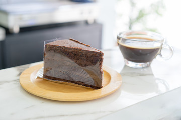 cake chocolate on wooden plate