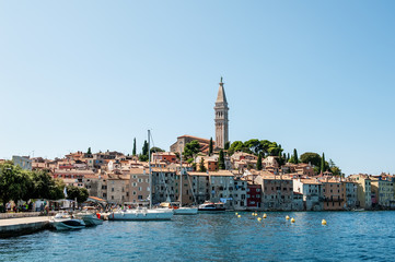 Naklejka na ściany i meble Beautiful and cozy medieval town of Rovinj, colorful with houses and church in Croatia, Europe