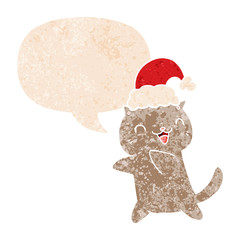 cute cartoon christmas cat and speech bubble in retro textured style