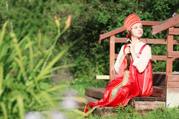 Obraz premium Slav woman in dress traditional