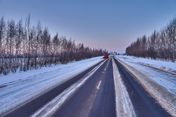 Obraz premium snow plow on a country road