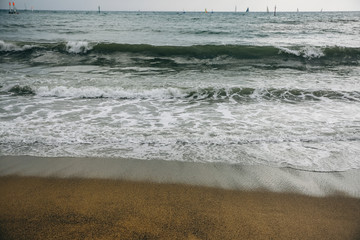 Beautiful beach. Summer sand and sun. Vacation concept. Travel and holiday photo. Barceloneta in the city.