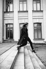 Girl in a coat black and white photo