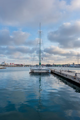 Fototapeta na wymiar Sailing boat in the port of Valencia, Spain