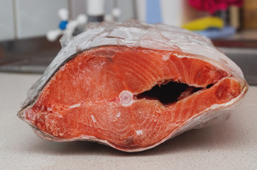 frozen fish sockeye salmon on the table