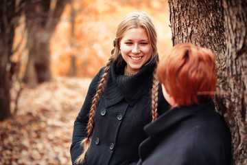 Young girl on a walk in the autumn