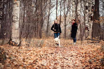 Young girl on a walk in the autumn