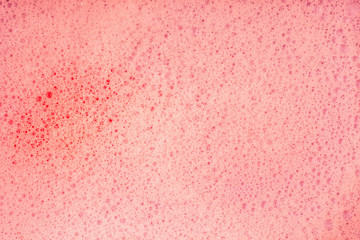Soap bubbles background- suds liquid