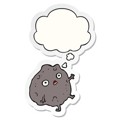 cartoon rock falling and thought bubble as a printed sticker