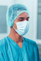 Portrait shot of a young dentist in the dentistry room