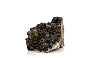 Macro stone Stannite mineral on white background