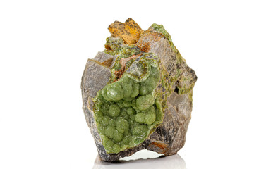 Macro pink Smithsonite mineral stone on microcline on white background