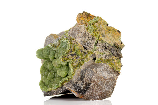 Macro pink Smithsonite mineral stone on microcline on white background