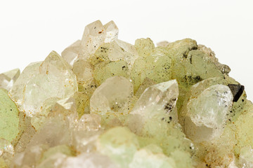 Macro stone mineral Prehnite Babingtonite On a white background