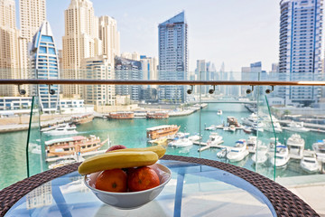Bowl with bananas and oranges in Dubai Marina